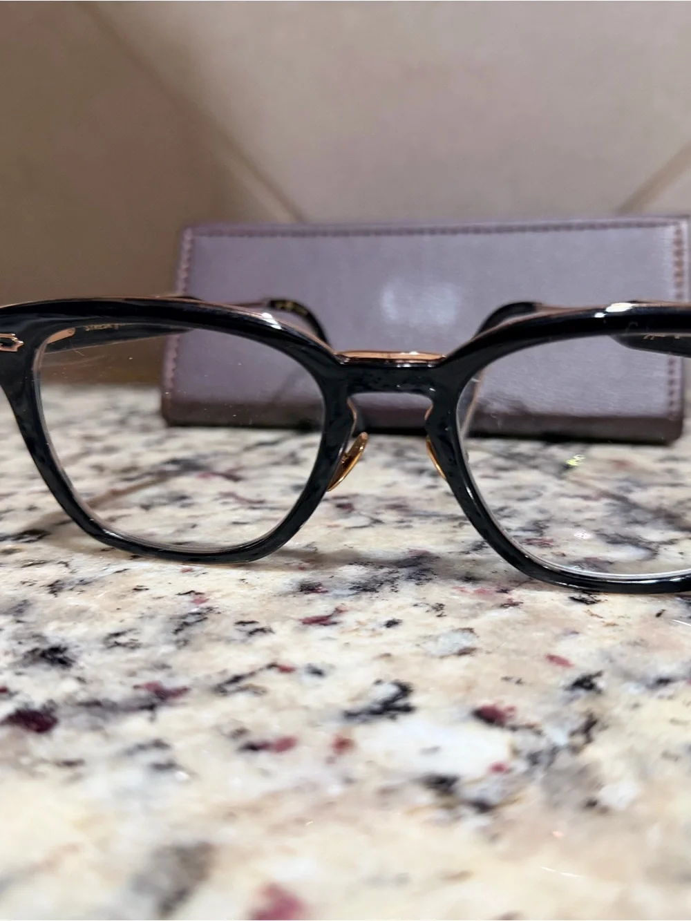 Black Frame Glasses with Gold Accents